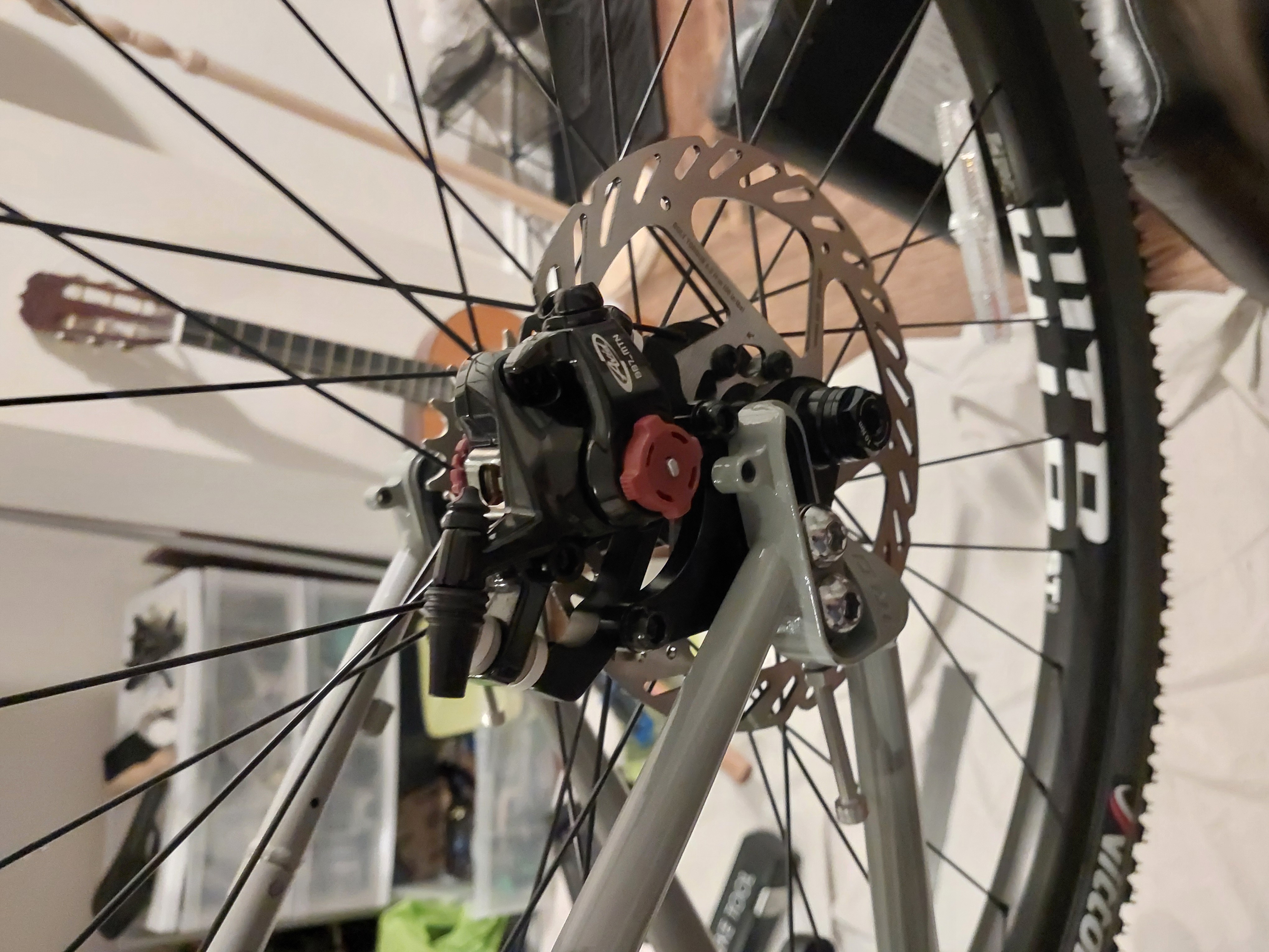 Disk brake calipers on rear triangle